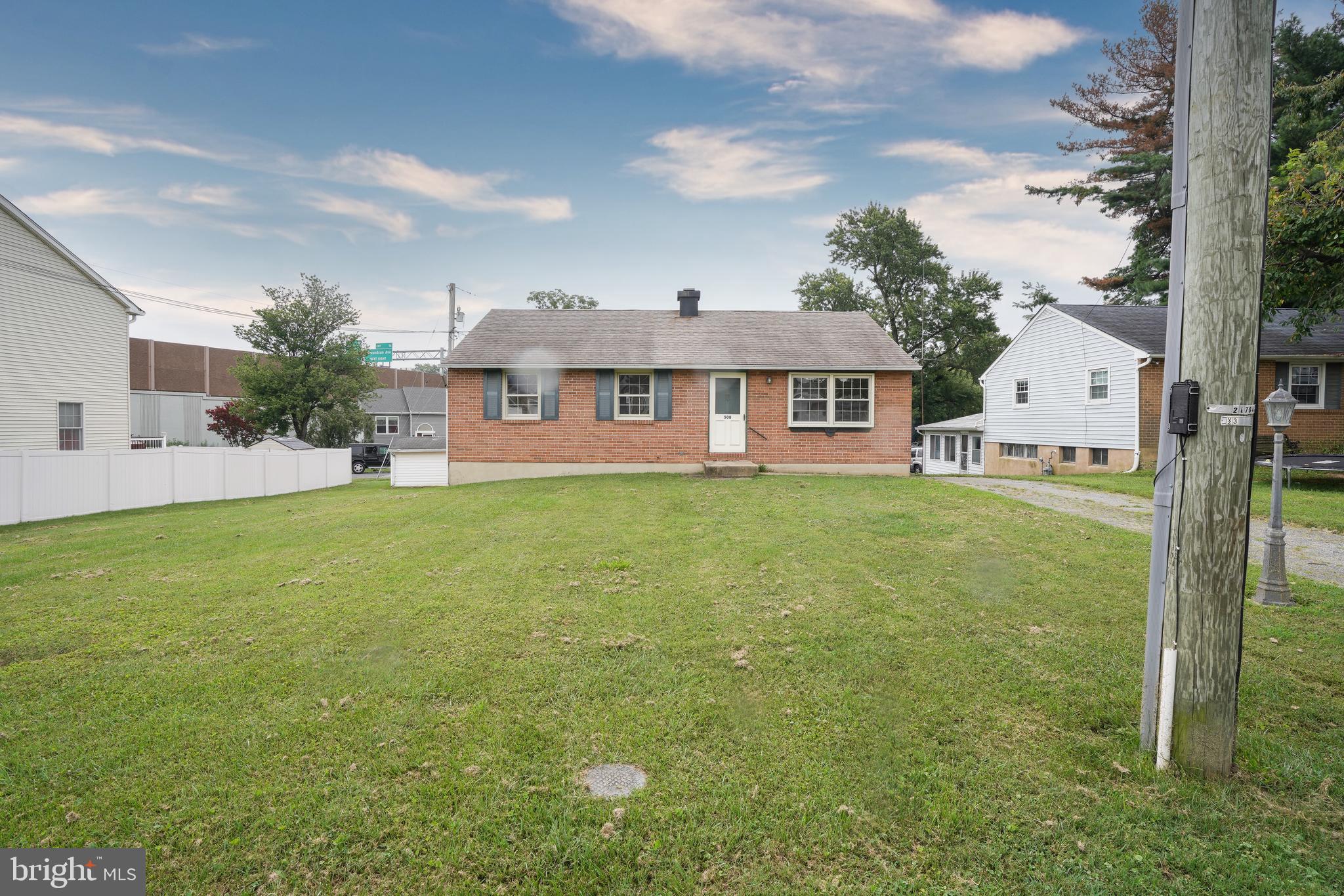 This brick rancher has 3 bedrooms and 2 full baths. The main level has been painted and the hardwood floors where refinished. The kitchen and bath could use some TLC but home has good bones and is almost 2,000 total square foot. Home has central a/c (approx. 8 years old), full basement (currently used as an apartment), roof is approximately 10 years old, 220 amp electrical panel and two driveways, one in the front of home and in the back. Home is being sold "as-is", but seller may be willing to offer a 1 year home warranty.