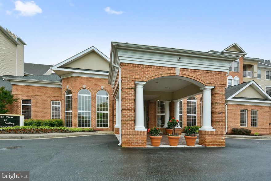 Full service concierge building with amazing amenities- garage parking (#1070, just a few feet from unit door and on same level), fitness center, pool, library, party room,  internet cafe, movie room. Unit boasts brand new hardwood floors, spacious walk in closet, brand new stainless-steel appliances, brand new quartz counter tops in the bathroom, in-unit washer/dryer, and white kitchen cabinetry with granite countertops.  This pet-friendly building is just steps from the Hunt Valley Town Centre, Wegmans, restaurants, entertainment, Light Rail, I-83, and more!