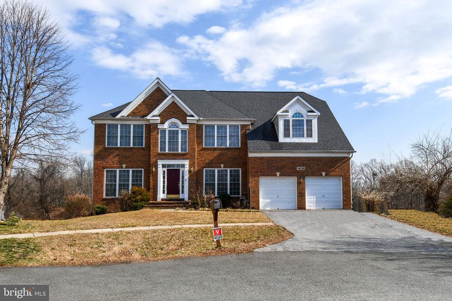 This stunning home welcomes you with abundant natural light, numerous windows, a gorgeous gas fireplace with a stone surround, and elegant classic crown molding throughout.
The chef’s dream kitchen features stainless steel appliances, granite counter tops, double wall ovens, and solid wood cabinetry that provides abundant storage. Thoughtful additions include a built-in desk, pantry, and extra cabinets, making the space both functional and stylish.
The formal dining room, highlighted by bright windows is perfect for hosting holiday meals and elegant dinners. A separate living room provides a more private setting for relaxing or entertaining guests.
The main level also includes: A convenient powder room ,main-level laundry,extra-large two car garage with direct access to the kitchen for everyday convenience.
Upper Level Retreat!!The primary suite offers a true retreat with multiple closets, including two walk-in closets, and a luxurious spa-style bathroom featuring: Dual vanities !A soaking tub with Jacuzzi, Separate shower!!!Four additional spacious bedrooms and two full bathrooms provide comfortable accommodations for family and guests.
Expansive Lower Level!!!The fully finished lower level is designed for fun, relaxation, and endless possibilities. Perfect for entertaining, it features: A full kitchen with bar area Walk-out access to the beautiful backyard.A full bathroom, a private entrance. This level offers excellent potential for a separate apartment or in-law suite.
Outdoor Living : Enjoy the outdoors on the spacious deck, ideal for gatherings, barbecues, or peaceful evenings.  Located within a mile of local amenities, this home offers quick access to dining, shopping, Downtown Silver Spring, and Washington, DC.
This one-of-a-kind property offers a rare blend of character, space, and convenience—ready for its next chapter with owners who will appreciate its charm and thoughtful touches.
Schedule your private tour today and discover all the possibilities this extraordinary home has to offer.