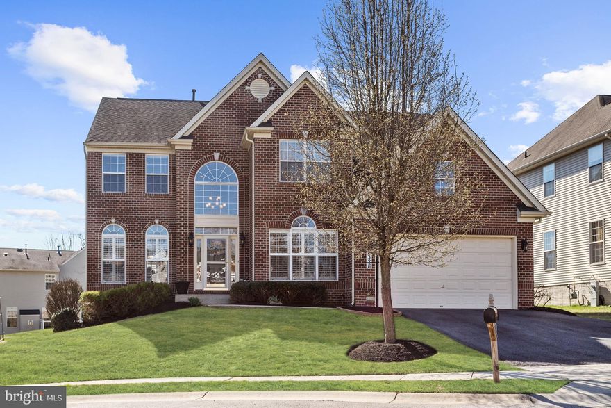 Beautiful Colonial located in the Autumn View community of Ellicott City. A grand 2 story foyer welcomes you to this stately home boasting oak hardwood floors and a beautiful color palette throughout. Formal living and dining rooms showcasing crown molding, box wainscoting, chair railing, plantation shutters  and tray ceiling, provide the perfect setting for intimate gatherings. Completely updated gourmet kitchen featuring 42 inch glazed maple cabinets, granite counters and stainless steel appliances . Bright and airy sun room featuring a cathedral ceiling with skylights and deck access. Opulent family room highlighted by a floor to ceiling stone fireplace. A study, laundry room and powder room complete the  main level living quarters. Spacious master suite boasts a stunning tray ceiling, walk in closet, cozy sitting room and luxury bath with soaking tub, dual vanities, and glass enclosed shower.  Fantastic lower level includes a recreation room, media room, den, exercise room, full bath and extra wide walk up stairs to the back yard. Maintenance free deck with custom powered awning and overlooking landscaped grounds.