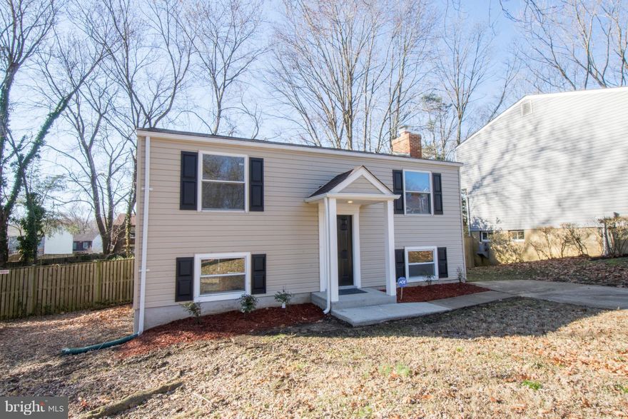 Wonderful, freshly updated Whispering Woods home. Many updates from new roof, new siding, new flooring, new appliances, new cabinets, freshly painted, & relined chimney. Kitchen features new granite counter tops and stainless steel appliances. Move in ready. Large backyard with plenty of space for fun activities. Located on cul-de-sac. Great location.