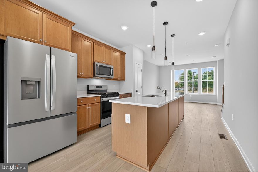 Most affordable new townhomes in the heart of Montgomery Village – Furnished Model Home now available to tour!
Welcome to the Abbey—an open-concept townhome that blends modern style with everyday convenience. Designed for flexibility and comfort, this home offers bright, functional spaces and thoughtful features throughout.
• Two ways to enter – through the inviting main entry or via the rear-load 1-car garage
• Spacious recreation room on the entry level, perfect for a media space, home office, or the option to convert into an enclosed bedroom with full bath
• Light-filled main living level featuring a sunny family room with sliding glass doors for future deck access
• Well-appointed kitchen with a generous center island, ample cabinetry, and a separate dining room for both casual and formal meals
• Two large upper-level bedrooms, each with its own bath and generous closet space
• Separate laundry room on the upper level for convenience
• Modern finishes, open flow, and the ability to personalize to your lifestyle
Tour the Furnished Model Home to experience firsthand how the Abbey combines style, comfort, and functionality in one beautiful package.
*Photos may not be of actual home. Photos may be of similar home/floorplan if home is under construction or if this is a base price listing.