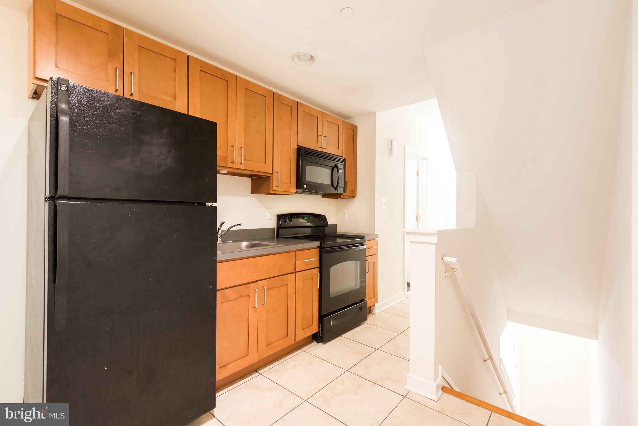 Available 8/1/25! Located on one of the finest blocks in the Temple University Campus Area! Welcome to this is spacious, updated, 4 bedroom, 2 bath apartment with hardwood floors, high ceilings, great natural light, in unit washer and dryer and private rear yard. Conveniently located to shopping, schools, parks and public transportation. Water is billed at a fixed rate of $65.00 monthly. Photos are from previous listing.