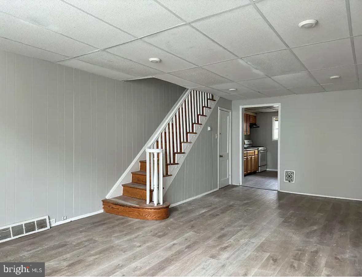 This charming three-bedroom, one bathroom rowhome is located in the rapidly developing Grays Ferry neighborhood of Philadelphia. Upon entering, you are greeted by a cozy living and dining area that seamlessly flows into the kitchen, which features new flooring, plenty of cabinet space and includes washer/dryer hook-up. Upstairs, you will find a full bathroom and nicely sized bedroom. Each providing ample closet space. You are within walking distance of local amenities ranging from big box store like Rite-Aid and The Fresh Grocer, but also a wide arrange of local shops and restaurants. The property is conveniently located near public transportation and is just a short drive from I-95, Center City, and New Jersey. Prefect starter home OR great investment opportunity with rent income possibility as high as $2,800.00 per month.