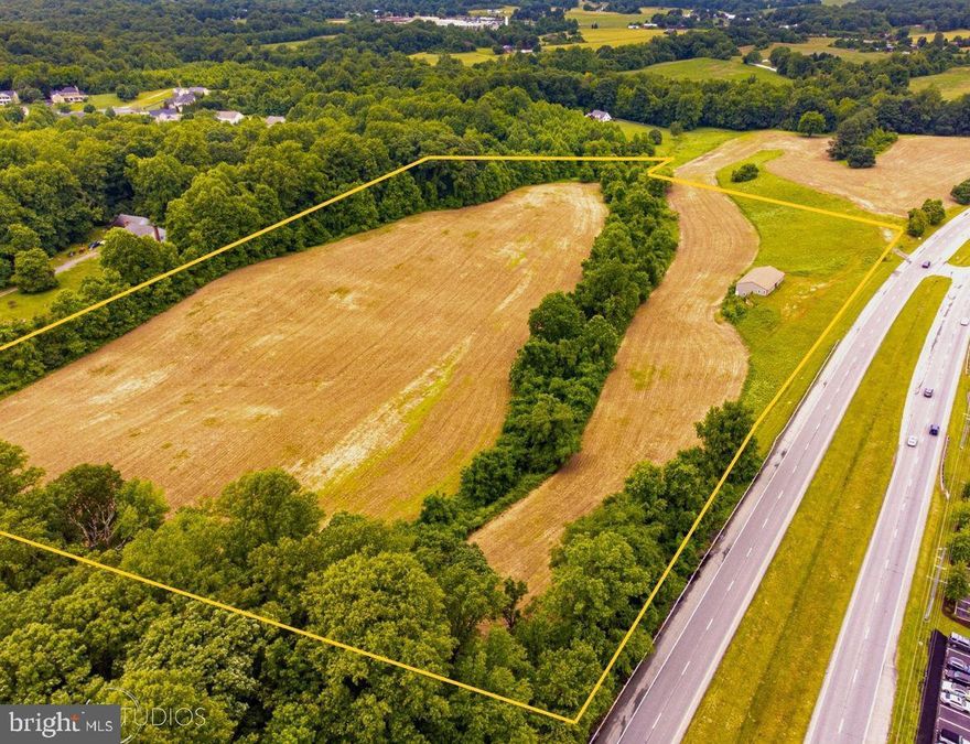 Fantastic Opportunity to own over 23 acres in northern Calvert County.  This property is a rare combination of a private rural setting with easy city access to D.C., Annapolis or Andrews Air Force Base.  Rolling farmland adjacent to dense wooded areas create a scene environment for a homestead.  Recently built 40' x 70' two level metal pole barn is currently used for farm equipment storage but could be upgraded.   Currently only agriculture operations.  Farm and Forest District Zoning allows some commercial uses.