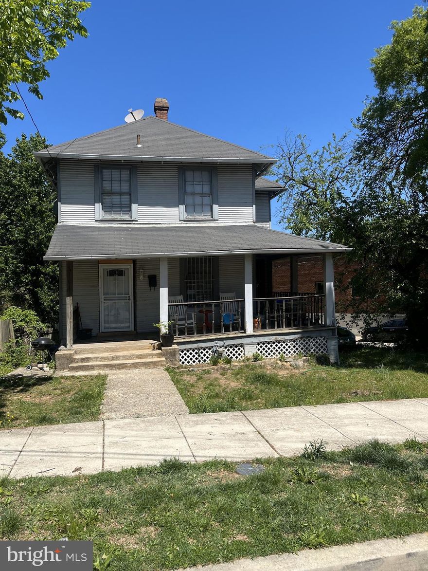 Perfect renovation opportunity for the home handyman or professional rehabber.  The property needs cosmetics and probably a new roof. The new owner can live in and fix up over time, or get a renovation loan.  There is a generous front porch and two decks on the rear, plus a fenced private back yard and two car off-street parking.  The neighboring Department of Parks and Recreation keeps the alley clean and plowed.

The home faces the rear of the "Off the Beaten track" crafts center, which houses the District's only Clay Center.  Many arts activities take place there. The Langdon Park Pool, Dog Park, Langdon Park Library, community garden, tennis courts and more are around the corner.  The shops and restaurants on Rhode Island Avenue are about half a mile away.

The property is in a private location but has excellent accessibility. The H2,H6,and H8 buslines are within walking distance.  The property is easily accessible to Rte.50/I95/295.  Major grocery stores are within a 5 minute drive. The Brookland and Rhode Island Metro (Red Line) stations are each less than two miles away.