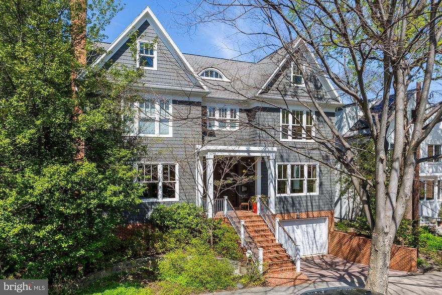 This beautifully renovated 6BR/5BA home is both eclectic and minimalistic. Main Level is perfect for entertaining with its open floor plan which includes a cozy Family Room, spacious Living Room, updated Eat-in Kitchen w/Butler's Pantry, Dining Room, Powder Room and picturesque screened-in Porch. Second Level features the Master Bedroom with two walk-in Closets and updated Master Bath and 3 additional bedrooms. The 3rd Level has a open play room/office area, full Bath and home theatre room. The Lower Level offers high ceilings, brand new carpet, bedroom with full bath, exercise room and plenty of extra storage. Private yard and Garage with 2 car parking in driveway!