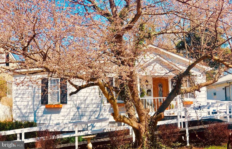 A cozy, 2 BR cottage in a quiet, friendly,  old,  well kept  neighborhood close to downtown Charles Town, restaurants, track, casino and a park .  The historic  Charles  Washington estate of "Happy Retreat" is across the street! The property is VERY ATTRACTIVELY IMPROVED  AND SIMPLY CHARMING.  Irregular lot with a porch overlooking a pleasant  backyard that looks to the woods. 20 minute drive to either Shepherdstown or Harpers Ferry MARC which both have MARC commuter train service to DC and the Maryland "federal" suburbs. MOVE IN READY! Full basement for lots of storage. Home is being sold by family, as Grandma can no longer manage.   Some  Furnishings negotiable.  All Highest and Best offers to be presented by 5:00 PM on Friday April 9th for review by seller.