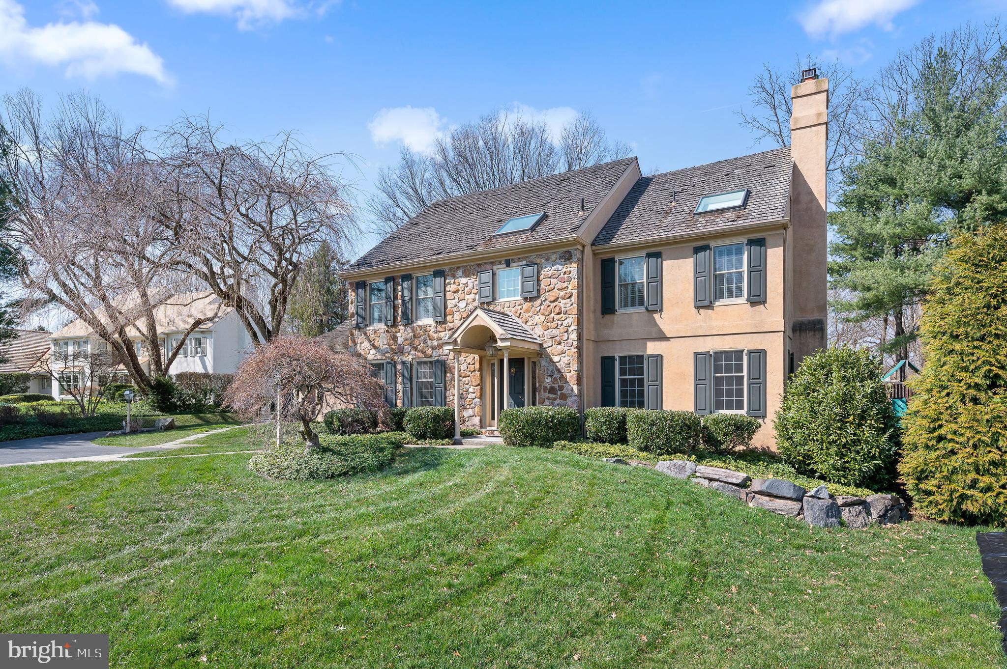 Life in the sought after development of Ravenscliff doesn’t get any better than at this “move -in-ready” beauty in Radnor Township. Completely renovated, this classic colonial offers a contemporary open floor plan, with a combination of formal and informal spaces that seamlessly flow together. Natural light bounces off gleaming hardwood floors creating a welcoming ambience from the moment you step into the lovely two story Foyer. Formal Living and Dining Rooms flank the Foyer graciously connecting the heart of the home which includes an amazing Family Room , Breakfast Room and exquisite gourmet Kitchen. A floor-to-ceiling stone fireplace sets the tone in these family friendly spaces that are flawlessly connected and capture the beautiful backyard. The Kitchen is a chef's dream with the finest appliances, amazing large island, exquisite countertops, custom cabinetry and so much more. Entertaining will be a breeze with a dry bar and outside access to a beautiful flagstone Patio. The First Floor is completed by a private Office with built-in bookcases, Powder Room, and Mudroom off of the large 2 car attached Garage. The grand staircase leads to the Second Floor where a beautiful Primary Suite awaits with an elegant spa-like Bathroom with a custom outfitted walk-in closet. Down the hall is a En-suite Bedroom with renovated Bath, and 2 additional Bedrooms with another updated Bathroom. The square footage of the home continues to the Lower Level featuring high ceilings, a Bedroom, updated Full Bath, as well as a game area and TV area. The beautiful backyard has a level lot, slate patio, and has direct access to a path leading to Dittmar Park. This stunning house is not to be missed. Showings begin March 21st!