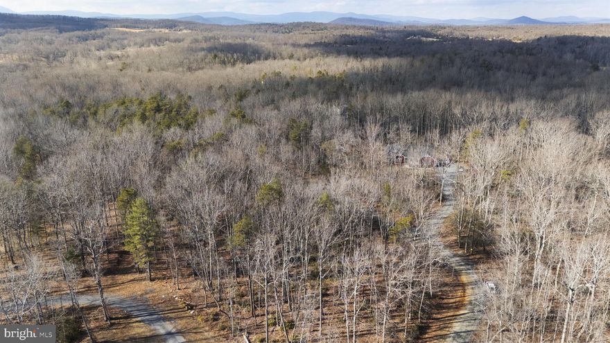 Ready for a spring project? Discover this beautiful, wooded 10-acre lot tucked away off a private road—a true blank palette awaiting your vision. Build your dream home surrounded by nature and privacy, while still enjoying the convenience of being just 15 minutes from town limits.