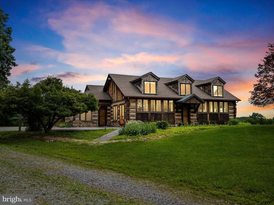 Sprawling 173 acre farm with spring and spring house! Grand one-level living at its finest - breathtaking view of the Blue Ridge mountains and rich pasture.  Log/stone home features 4 beds 3 full bath.  Living/dining and separate family room. Solid wood doors, hardwood floors showcase the double-sided stone fireplace. Wall to ceiling windows and skylights allow tons of natural light.  Primary suite with walk-in closet(s)/office with lots of storage options .  Large, detached garage, patio for outdoor entertaining.  Whole house generator.  Located approximately 5 miles east of Berryville in Clarke County enjoy specialty farms, vineyards and wineries.  Two 4 acre lots each including DUR's listed/sold separately.