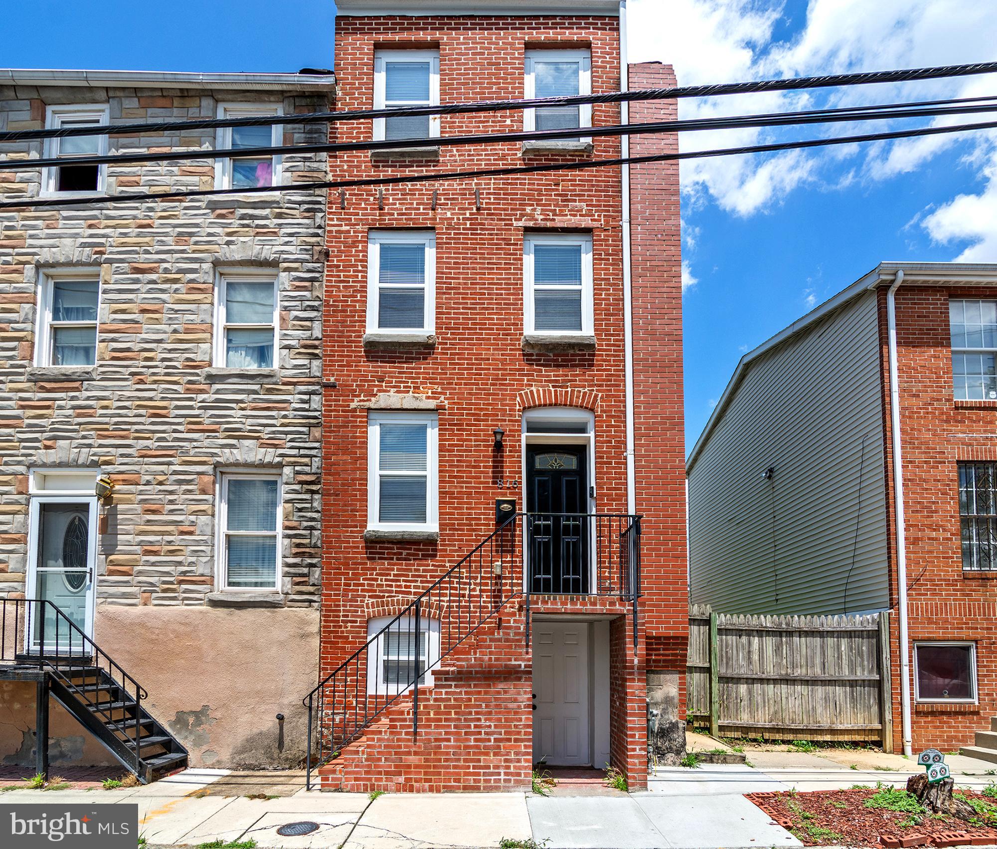 Fully Renovated 4-Level Beauty in the Heart of Pigtown!
Step into style, space, and sophistication with this stunningly renovated 3-bedroom, 4 full bathroom rowhome that perfectly blends modern living with Baltimore charm. From top to bottom, this home is packed with high-end finishes and thoughtful updates that make everyday living feel extraordinary.
Walk into an open-concept main level with sleek recessed lighting, a flowing layout, and a gourmet kitchen that will steal your heart featuring stainless steel appliances, granite countertops, and a statement tile backsplash. It’s the ideal setup for entertaining or quiet nights in.
The second level offers two generously sized bedrooms, including a primary suite with a private en-suite bath and its own deck your perfect morning coffee spot. Both bathrooms feature contemporary finishes.
The finished basement adds serious flexibility with a full bathroom and space perfect for guests, a media room, or your dream home office.
Need even more space? The fourth level delivers with a private bedroom, full bathroom, and cozy sitting area perfect for multigenerational living or a luxe guest retreat.
All major systems have been updated—HVAC, plumbing, electric, and water heater, so you can move in with total peace of mind.
Tucked in the vibrant Pigtown community, you’re just steps from M&T Bank Stadium, Camden Yards, the B&O Railroad Museum, and minutes from I-95, downtown Baltimore, and more.
This home offers space, style, and a location that can’t be beat.
