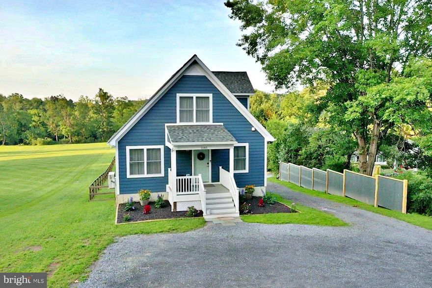 Water Front!!  Outdoor living at its finest - your private retreat awaits!   Step outside and experience the ultimate in outdoor living.  This beautifully maintained 3 bedroom/3 full bath home offers a seamless blend of indoor comfort and outdoor adventure featuring your own private creek front paradise.  Whether you are enjoying warm summer evenings under the stars on the expansive deck or sipping morning coffee on the primary bedroom balcony, this home will make every moment feel like a vacation.     Composite decking, vinyl railing,  a concrete patio, and LP smart siding make this modern chalet style home perfect for a low maintenance lifestyle.   Step inside to an open concept floor plan, granite countertops, and LVP/tile flooring throughout.