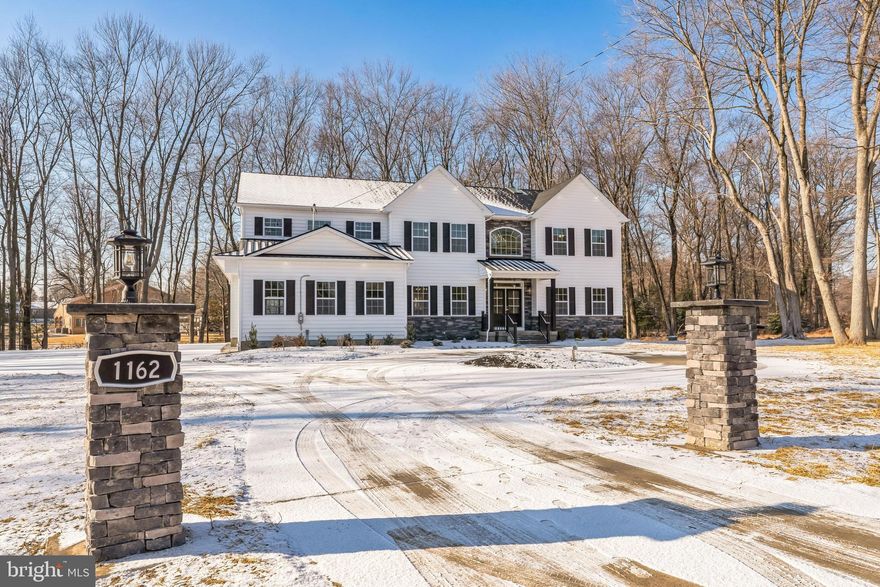 Another Snyder Homes beauty. This home is over 6,000 SF with the finished basement and is located on a large 1 + acre lot. The home is fully loaded including a theater and gym in the basement, an outdoor kitchen with built in grill and sink. Too many upgrades ad features to list here.