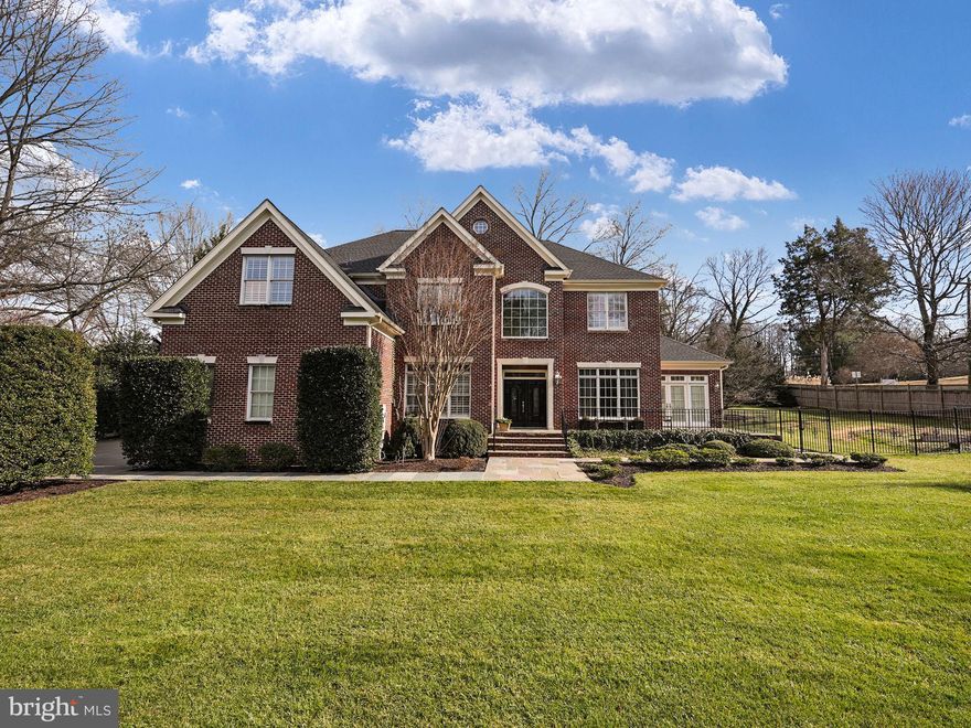 Stunning home! Move-in ready!  With more than 7000 square feet, this transitional colonial style, all brick, Langley Forest home is minutes from Washington, DC.  The home boasts six-bedrooms (five upstairs), four full baths and two half-bathrooms, perfect for a family or anyone who enjoys the natural beauty and modern convenience this inside the Beltway McLean neighborhood of custom homes provides. 
This home has it all with a spacious gourmet kitchen and large indoor and outdoor living spaces. Hardwood floors, 10' ceilings and classic plantation shutters are located throughout.  
Owners will delight in welcoming guests into the foyer where you will find a generously sized formal office on one side with built in floor to ceiling bookshelves overlooking the front garden.  Straight ahead past the powder room, and spacious closet for housing outdoor attire, you'll enter a beautifully designed main living area, which includes a massive family room with a gas fireplace focal point and a splendid gourmet kitchen featuring a full suite of stainless-steel Viking appliances including a 6-burner gas range, additional electric wall oven, quartz countertops, 7'x5' kitchen island with a breakfast bar that easily seats four, bar sink, beverage cooler and a spacious walk-in pantry. 
Oversized French doors open to the rear screened porch from the kitchen, creating an open flow for everyday living and entertaining. You will delight in this massive outdoor oasis built by BOWA with custom ceiling fans and lighting complete with TV hookup and a second gas fireplace with a large dining area as well as lounging area for viewing your favorite shows. Exit the screen porch and relax on the oversized flagstone terrace while you enjoy the views in the large rear yard. There is a gas grill hookup on the rear of the terrace for easy outdoor dining. 
The formal dining and living rooms are connected to the kitchen and foyer and flow into a beautiful sunroom with plantation shutters, perfect for relaxing. Enjoy the four seasons from this serene space.  The massive primary bedroom suite is on the second floor and features two walk-in closets and a spacious ensuite bathroom with dual opposing sinks. The second level has four more generously sized bedrooms and two bathrooms, one being a Jack and Jill. Centered between the bedrooms sits a multipurpose flex room that could be a media room, study area, or exercise/lounge room. Everyday function and convenience is achieved with the large laundry/utility room on the second level too. 
The lower level was beautifully designed by BOWA with both function and style in mind. Generously proportioned, the lower level family room is built for entertaining and more. There is a sixth bedroom in the lower level which features a large closet and a private full bathroom, creating the perfect guest suite. Additionally, you will find a separate light and bright room which current owners used as a music room with a custom glass entry door and built-in shelving. Andersen French doors lead up the stairs and provide an open flow to the outside terrace, rear patio and yard. 
This home has a side entry attached three-car garage with lots of built in shelving. Mudroom entrance from garage with built in open storage for every day practical living as well as a large coat closet and laundry sink. This mudroom is also primed for a second laundry center.  
The home sits on a spacious 1.15 acres that is fenced for privacy and play.  At the rear of the property is another separate flexible structure that can be used as an artist studio, storage area, antique car garage, or even a potential pool house. Langley Forest is a coveted community of custom homes with no HOA. This home's attributes and location make it the perfect blend of sophisticated living and convenience.  Within walking distance to Langley, Cooper, Churchill & St Luke Schools. Easy walk to downtown McLean & Clemyjontri Park.