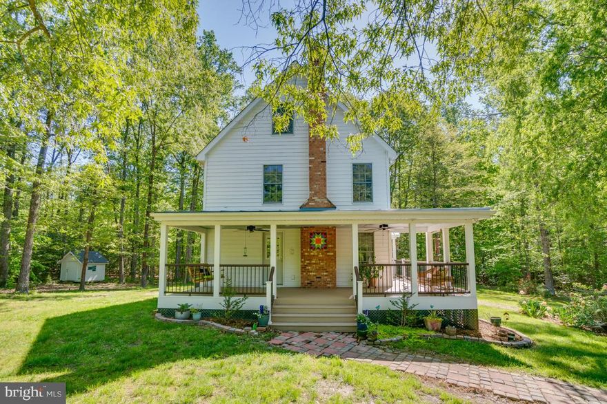 One of a kind property that you shouldn't miss!  Almost 28 acres that are partially wooded and cleared with fenced pastures along with a large garden.  The home sits hidden in the middle of the lot which provides peace and quiet from the world!   Just sit on your brand new porch swinging with the breeze and listen to the sounds of nature!  This farmhouse has a country kitchen,  breakfast area,  dining room and  a large family room with a wood burning stove.  Hardwood floors are dominate throughout the home including the stairs.  The master bedroom and bath are on the 2nd floor along with two other bedrooms and a full bathroom.  Then, don't forget the hidden finished space in the attic!   There are also three large outbuildings.  Two are used for storage and equipment while the third building is a huge 30 x 44 shop with water and electricity.   This is a hidden gem  in our county and won't last long!