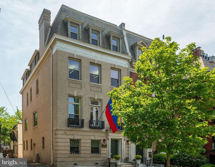 Elegant, renovated manse. Formerly used as an embassy, it's move-in ready. Approx 5,500SF on 4 lvls. Grand, wide staircase is capped by a large skylight, illuminating the property w/ sunlight. Wood floors throughout upper lvls; kitchenette, baths & fireplace on ea. level. The property could easily be transformed into a grand residence. Location!