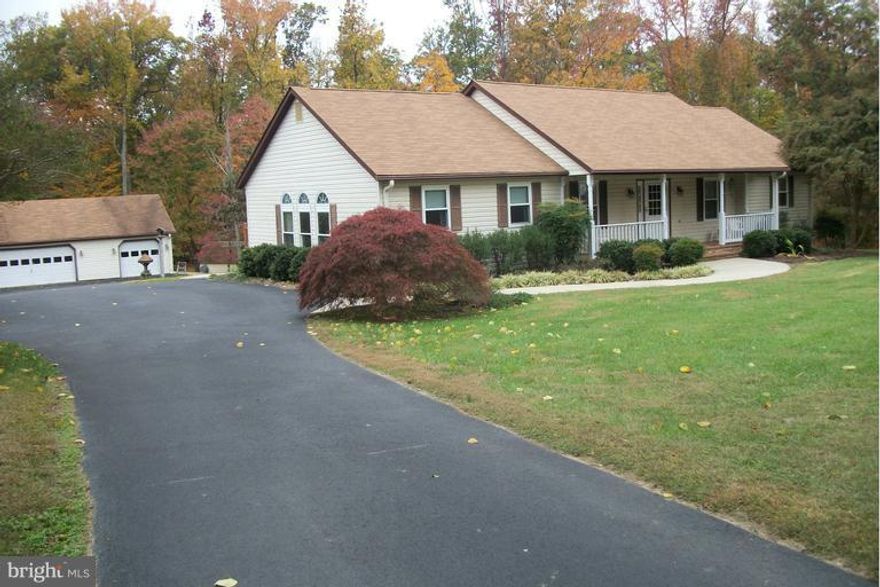 WOW!!! GREAT RAMBLER JUST 2 MILES SOUTH OF PATUXENT NAVAL STATION AND LEX PARK. VERY PEACEFUL AND A 2 ACRE  LOT. OVERSIZED 3 CAR GARRAGE WITH OVERHEAD STORAGE AND A WALK UP STAIRS. ALSO HAS A LARGE WORKSHOP AREA. LOTS OF ROOM IN THIS HOME AND A LARGE DECK ON THE BACK. THIS IS A PRIVATE SETTING AND THE HOME  SHOWS VERY WELL. BACKS UP TO THE WOODS AND A NICE SHED IN REAR OF HOME. LOTS OF PARKING.