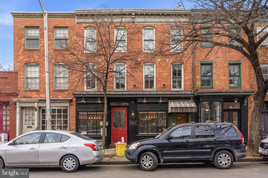 Secure your future investment in Baltimore’s historic 21201 corridor with this well-maintained, income-producing mixed-use property. Featuring a stable commercial anchor and a premium residential unit, this is a rare opportunity for an investor seeking immediate ROI, rent, and zero vacancy at closing. The Commercial Suite is occupied by a long-term, established tenant. This street-level flexible space benefits from high visibility and consistent foot traffic, anchored by the dense  population of the Mount Vernon/Downtown area. Upstairs: A spacious and modern 3-Bedroom, 2.5-Bathroom apartment. This isn't your average rental; it’s a high-demand, open-floor plan currently occupied by long-term residents. The property is close to the UMD Medical Center, the Penn Station light rail, and the city's cultural heart. The property is registered as 1 parcel and 3 stories. Unit 225 is the commercial ground level portion. Unit 227 is the residential space comprising the top 2 floors with a separate entrance. This opportunity offers true dual functionality.