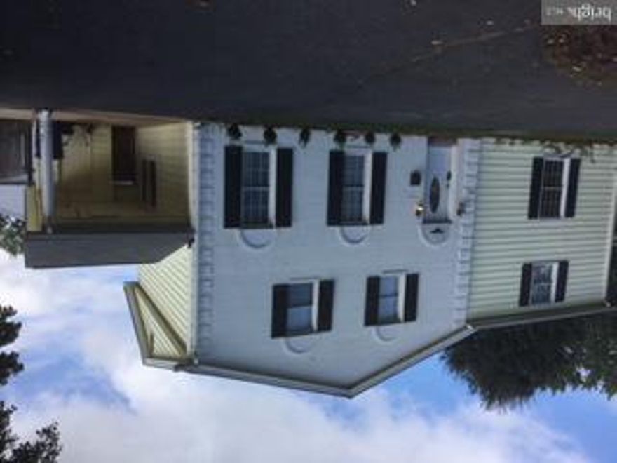 Wonderful 4 bedroom 2.5 bath single family home with a very large 2 car detached garage and workshop.Refinished wood floors with ceramic tile kitchen.  Large family room with wood stove. New washer and dryer.  Excellent location minutes from the soon to be finished Herndon metro stop.