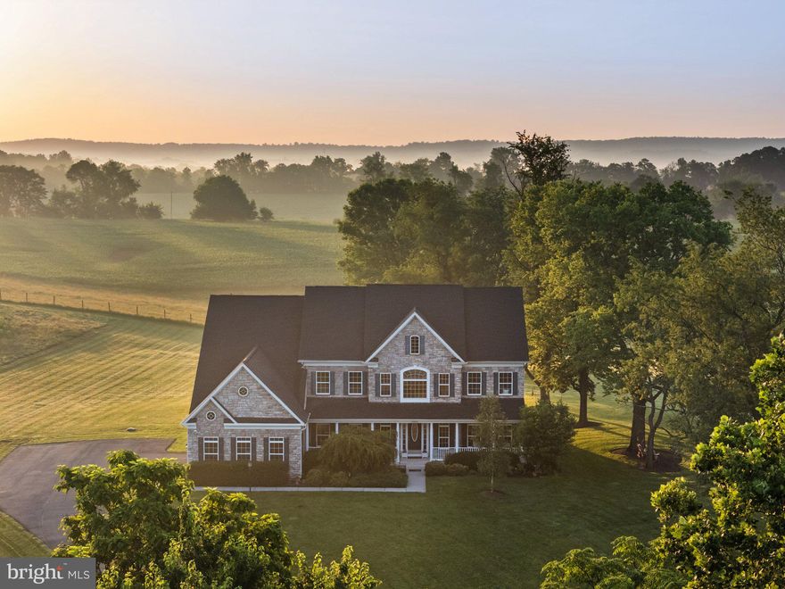OPEN HOUSE CANCELLED, SUNDAY, JULY 13!!! Views Views Views!! Welcome to your dream retreat — a stunning 5-bedroom, 4.5-bath impressive home nestled on 15 private acres with sweeping panoramic views to the east and sunset views to the west. Backing to conservation farmland, located on a quiet cul-de-sac with other large-acreage homes, and horse/farm-friendly, this property is truly special—homes on land like this rarely come available. If you've been looking for a Loudoun County property with stunning VIEWS and ACREAGE and a CONVENIENT location, this is the one for you! Thoughtfully designed with luxury and livability in mind, this exceptional property offers a seamless blend of elegance, comfort, and natural beauty. Inside, you’ll find a light-filled open floorplan with soaring ceilings, wood floors, and views of the extraordinary vistas . The heart of the home is a true chef’s kitchen, complete with high-end stainless steel appliances, including a professional range with double ovens, a third wall oven and built in microwave, two dishwashers, warming drawer, and trash compactor. Beautiful, white custom cabinetry to the ceiling, and an oversized island  with seating for four make this kitchen perfect for entertaining or fun meals with the family. A main-level office offers the perfect space for working from home.  The laundry room is conveniently located upstairs on the bedroom level, but the mudroom on the main level also offers a washer/dryer hook-up in case you want a second washer/dryer set. 

Upstairs, the spacious primary suite offers massive walk-in closets (yes, that's plural -- as in two!) and a spa-inspired bath with beautiful claw-foot tub and extra-wide double vanities. Three additional generous bedrooms and two beautifully appointed baths provide space and privacy for family and guests alike.  Downstairs, you'll find a stylish and spacious basement ready for fun!  Whether you're hosting friends at the luxurious bar, lounging in the cozy family room, or squeezing in a workout in your own private gym, this finished basement has it all. There's also a bedroom and full bath, perfect for guests. Step outside to your backyard oasis, complete with a built-in grill area, fire pit, and expansive patio.
Whether you're enjoying the sunrise from the back patio, hosting dinner parties under the stars, or exploring your own private acreage, this property is a rare find. With plenty of room for gardens, horses, hobbies, or just room to breathe, it offers a private retreat tailored for elegant country living.  Don’t miss your chance to own this stunning property that combines refined interiors with the serenity of wide open spaces!
