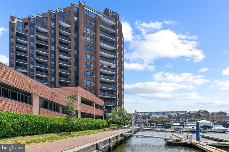 PRICE ADJUSTMENT  ON THIS BEAUTIFUL CONDO.   Live like you’re on vacation every day in this gorgeous spa-inspired condo overlooking the inner harbor of Baltimore!   Awaken to sunrise over the Francis Scott Key Bridge, and await the arrival of ships and pleasure boats to the waters right outside your balcony door.  This great condo comes completely furnished (if you desire) so if you’re looking for a weekend retreat or an easy move, this one is ready for you!   Completely refinished and refreshed with sleek new flooring, beautiful new kitchen, new primary/guest bathroom with barn door, and a soft neutral palette throughout.  One of the largest one-bedroom condos you’ll find on the market; it also includes a huge walk-in closet near the entryway, which could easily double as a compact home office, and there’s a separate storage unit as well.  A reserved/deeded parking space is included in the adjoining garage, and there’s plenty of parking for your visitors as well.  There’s a secure entry and 24-hour front desk, making deliveries of packages and mail easy and ultra-secure.   On the floor above the lobby is the community room and there’s also a nice gym.  The Anchorage is a 14-story, 84-unit building situated directly on the waterfront in Canton, in one of the best locations in all of Baltimore.  Overlooking marinas and the vibrant cityscape, The Anchorage offers easy access to the heart of downtown, or to nearby commuter routes and I-95.  This beautiful space and this wonderful view can be yours!