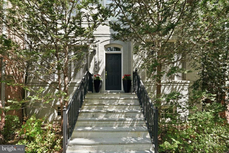 Set within one of McLean’s most desirable enclaves, this distinguished four-level all-brick townhome offers a rare blend of timeless architecture with 4BR's/5.5BA's, refined interiors, and tranquil pond views. Thoughtfully designed for both elegant entertaining and everyday comfort, the residence unfolds with a gracious open floor plan, 10-foot ceilings, and rich hardwood flooring spanning the main and upper levels.

At the heart of the home, a beautifully appointed gourmet kitchen features granite countertops, a cooktop, and double ovens, seamlessly connecting to sophisticated living and dining spaces anchored by two fireplaces and enhanced by custom built-ins. Just beyond, a private rear patio invites quiet moments overlooking the water—an unexpected retreat in the heart of McLean.

A private elevator services three levels, adding ease to daily living, while a dedicated library provides the perfect setting for work or reflection. The primary suite is a true sanctuary, offering a spacious sitting area, an expansive walk-in closet, and a luxuriously appointed en-suite bath.

The upper level provides additional bedroom space ideal for guests or flexible living, while the fully finished lower level offers a generous recreation room, full bath, and abundant storage—perfectly suited for entertaining or extended stays. A two-car garage further enhances convenience.

Located just moments from McLean’s premier shopping, dining, and commuter routes to Washington, D.C., this exceptional residence embodies a lifestyle of sophistication, comfort, and effortless accessibility.

Open House cancelled. Now under contract.
