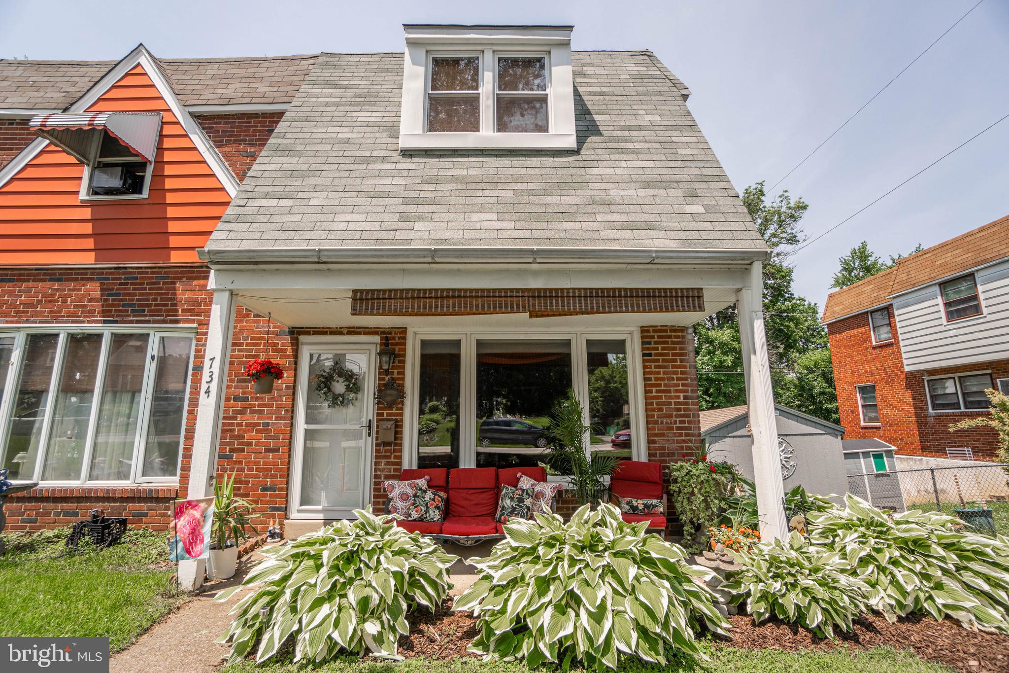 Welcome to 734 E 25th Street, a charming 3-bedroom, 1.5-bath twin home nestled in the North end of Chester. As you approach, you’re greeted by a welcoming covered front porch — the perfect spot to enjoy your morning coffee or unwind at the end of the day. Step inside to find a bright and cozy sunken living room featuring hardwood floors, a ceiling fan, and a bay window that fills the space with natural light. Just two steps up leads you to the dining room, also with hardwood floors and two bright windows. This space offers plenty of room for gatherings and also provides access to the basement. The adjacent eat-in kitchen includes a ceiling fan, tile backsplash, gas cooking, and ample cabinet space — a functional setup for everyday living. Upstairs, the primary bedroom features hardwood floors, a ceiling fan, and convenient access to the attic. The full hall bathroom offers tile flooring, a granite-topped single sink vanity, and a tub/shower combo. Two additional bedrooms, both with hardwood floors, are ideal for children, guests, or a home office. The finished basement adds valuable living space with a comfortable family room, a ceiling fan, and direct access to the backyard, 1-car garage, and laundry area. A convenient half bath completes this comfortable living space. The home also features 3-car parking with a new large shed for extra storage. This home has been updated with newer windows, doors, HVAC, roof, and many other upgrades. All furniture shown in the home is available for purchase but is not included with the sale of the property. This home offers everything you need — with the added benefit of a great location close to local shopping, grocery stores, restaurants, and more. Plus, quick access to I-476 and I-95 makes commuting a breeze. Don’t miss the opportunity to make this lovely home yours!