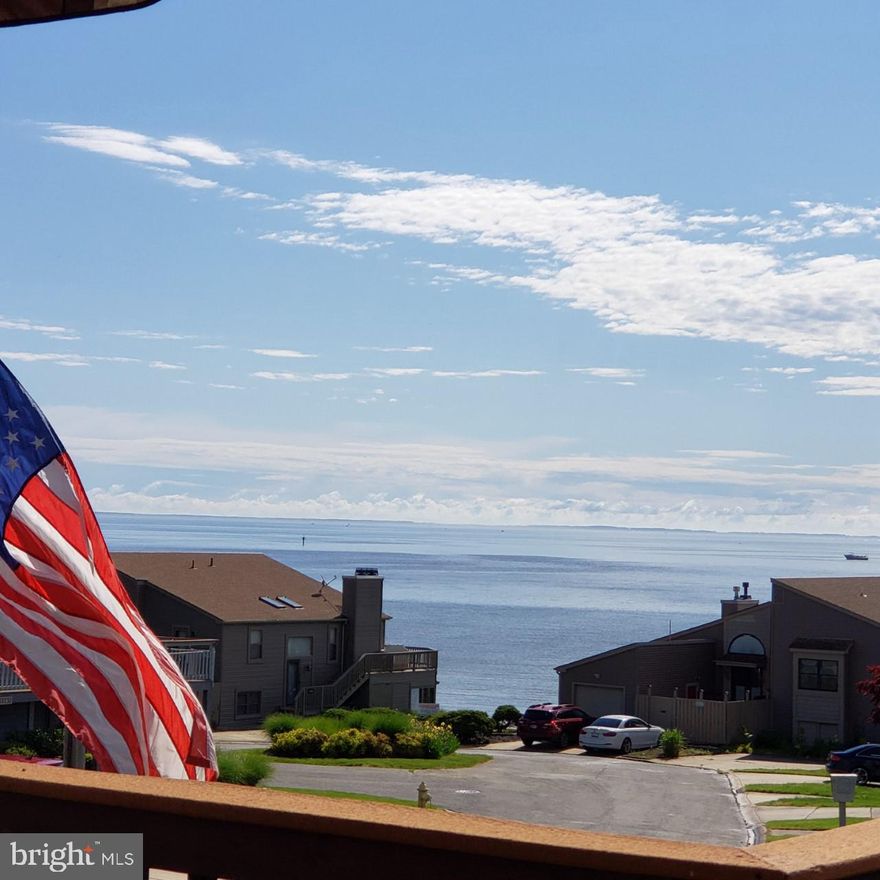 Awesome views from this beautiful home in sought after Chesapeake Station.  Move-in ready, everything has been done for you.  Corner lot.  Large deck with an automatic awning that retracts automatically when the wind reaches 17 mph.  Matching awning over the front door too.   Large patio below with a "ceiling" so you can enjoy it even when it's raining.  Inside everything has been done for you from the beautifully updated kitchen to the walk-in shower, built-ins, double-hung windows, skylights are brand new.  Beautifully landscaped for your enjoyment, from Camellias to roses, Lillies, Hostas, Hydrangea, Japanese Maple, Weeping Cherry tree, and more.  Enjoy your morning coffee and breakfast from the large deck with an exceptional view across the Chesapeake Bay.  Have a front-row seat for the Annual Town of Chesapeake Beach Fourth of July Fireworks.  A walkable neighborhood, with sidewalks throughout, take a stroll along the bay and stop at one of the benches to take it all in, enjoy the most beautiful sunrises around.  You must see to appreciate.  If you're looking for a home that is move in ready, this is it.