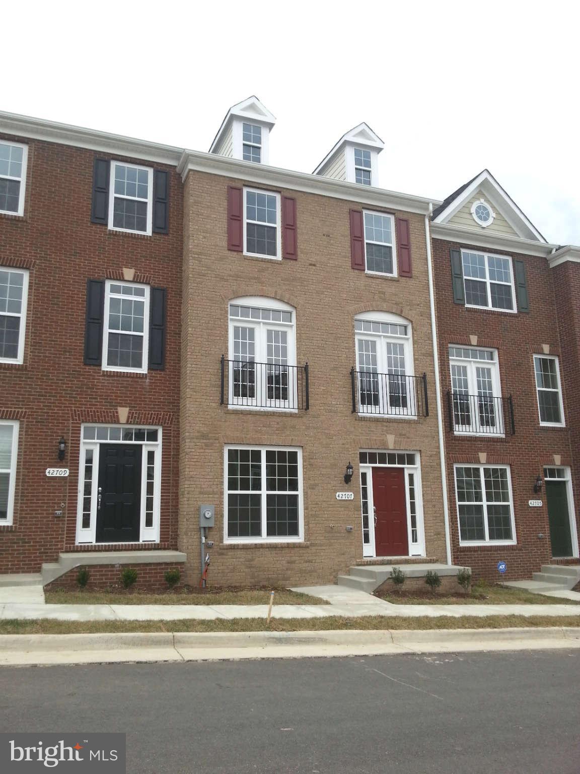 Spacious Brick Front Townhome in Goose Creek Village
Discover the perfect blend of style and convenience in this stunning townhome featuring 3–4 bedrooms, 3.5 baths, and a 2-car garage. The entry level includes a versatile den/office with a full bath and garage access. The main level boasts gleaming hardwood floors, a gourmet kitchen with granite countertops, stainless steel appliances, and a private balcony — perfect for morning coffee or evening relaxation.
Upstairs, find three bright and spacious bedrooms and two full baths, including a luxurious primary suite. Ideally located within walking distance to Goose Creek Village shops and restaurants, with easy access to major highways, commuter parking, the Metro, and Dulles Airport. All within the sought-after Stone Bridge High School pyramid.
Don't miss this opportunity — schedule your tour today!