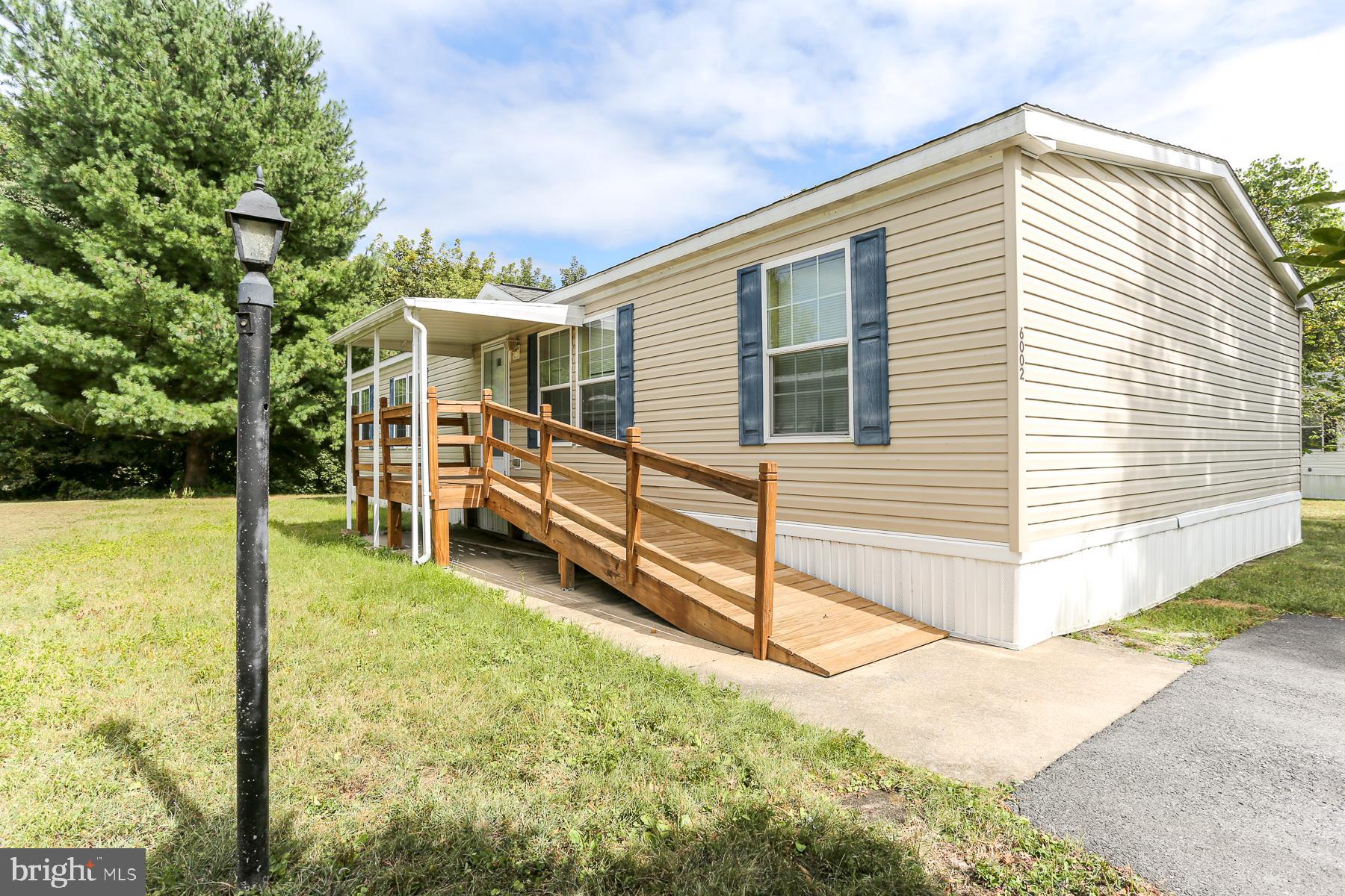 Welcome to this 3-bedroom, 2-bath home located in the desirable Hampden Village community. Offering both comfort and functionality, this property features a spacious living room, kitchen with breakfast bar and adjoining dining area. The primary suite with a sitting room is complemented by two additional bedrooms and a second full bath. Practicality meets convenience with a dedicated laundry room, while outdoor living is enhanced by a welcoming front porch w/ ramp and a rear deck overlooking the nice lot. Whether you’re relaxing inside or enjoying the outdoor spaces, this home is ready to fit your lifestyle. Convenient location close to major thoroughfares, shopping schools and more! Don’t miss the opportunity to make this affordable home yours!