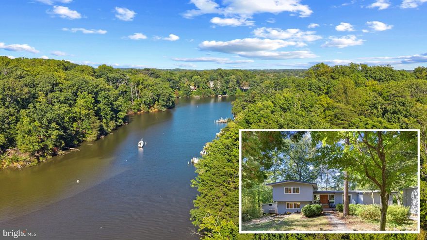 Tucked back from the road and surrounded by trees, this contemporary waterfront home offers privacy and a serene connection to nature. Unique original details have been thoughtfully preserved while the interior has been completely renovated for modern living. From the moment you enter, walls of glass draw your eye through the home to the expansive deck that stretches nearly the full length of the house, showcasing tranquil views of Weems Creek through the trees. The open floor plan features a living room with an electric fireplace providing supplemental heat, a beautifully remodeled gourmet kitchen with bar, a dining area, and a conveniently placed mudroom, pantry, and powder room. Upstairs, two ensuite bedrooms include a spacious primary suite with multiple closets and a skylit bath with walk-in shower. The lower level hosts two additional bedrooms and a shared bath with steam shower, while an unfinished basement level provides storage and houses the utilities. Outside, the deck is ideal for entertaining with multiple seating areas and an outdoor TV. While the waterfront is not currently accessible, the property offers potential for private water access and a pier. Whether enjoying the everchanging scenery and waterfowl from indoors or taking in the view from the deck, the setting is captivating. The sought-after Admiral Heights community provides voluntary HOA membership with access to waterfront amenities, a boat club, pool membership, and neighborhood parks. Located within close proximity to restaurants, groceries, shopping and Navy Stadium events, with easy access to all major commuter routes to DC, Baltimore and beyond. Welcome Home!