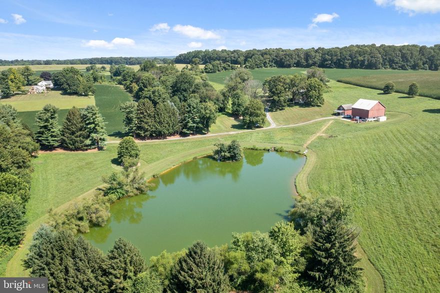 Pheasanthill Farm is in a spectacular setting on two quiet country roads in Chester County! 110 acres is under an Agricultural Conservation Easement and is a combination of meadows and crops. The remaining 57+ acres is not conserved and includes the house, barn, ponds and woodlands. The barn was an original dairy barn and has a garage with an apartment. Two spring-fed ponds are on the property and include a charming springhouse. A long tree-lined drive leads you to the brick farmhouse and barn, each with their own drive. An original 1865 Farmhouse looks out over a picturesque 167+ acres of unparalleled privacy and stunning views of the countryside. A front porch offers a quiet place to enjoy views of the barn, pond and woodlands. The farmhouse kitchen has an island, ceiling fan, skylights and is open to a den with a fireplace and additional stairway. Off the kitchen is a lovely brick terrace with views of the barn and countryside. A very private and serene setting perfect for quiet relaxation any time of the day!! Center hall opens to the dining room, living room with corner cabinet and great room with three walls of exposed brick and a must see fireplace! Main staircase gives access to the front porch, which offers a quiet place to enjoy views of the barn and ponds. The main staircase leads to the second floor, which has 4 bedrooms and 2 full baths, one with a laundry. This property offers endless opportunities. Whether for the equine enthusiast, a working farm for crops or cattle and/or your own private retreat!! Property has 4 tax parcels and potential for subdivision.