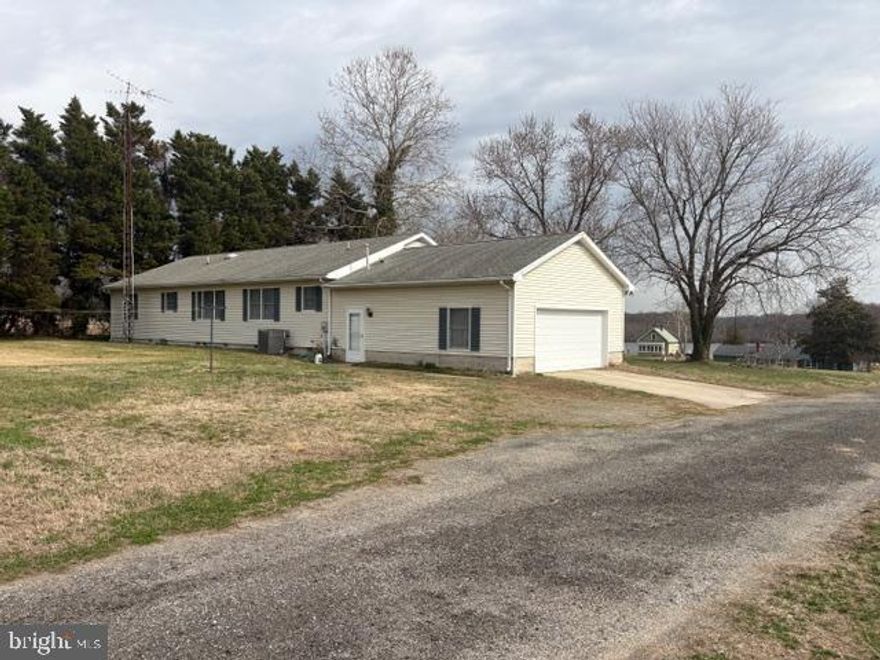 Productive Caroline County grain farm approximately 340 acres in 4 parcels with 270+/- tillable acres with 200+/- under pivot. Soil has been grid sampled and is well drained. Farm is improved with three large machine sheds, the potentially usable footprint of a pervious milking parlor and a 3  bedroom, 2.5 bath Rancher overlooking the Choptank River. No easements.