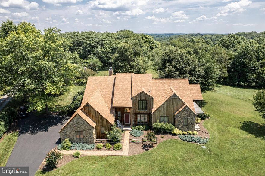 Gorgeous 7+ acre property with beautiful updated home and fantastic 26 X 42 ft outbuilding.
This is one amazing property!!
Everything has been lovingly maintained and updated  through out!
Large home with wonderful 3 level sun/great room addition. Upper level ready for one or two more bedrooms and full bath. Great storage room on lower level.
Gorgeous 7+ acre lot complete with 26 X 42 ft outbuilding with solar panels ,shed, huge deck and screened in porch. You won't be disappointed!!