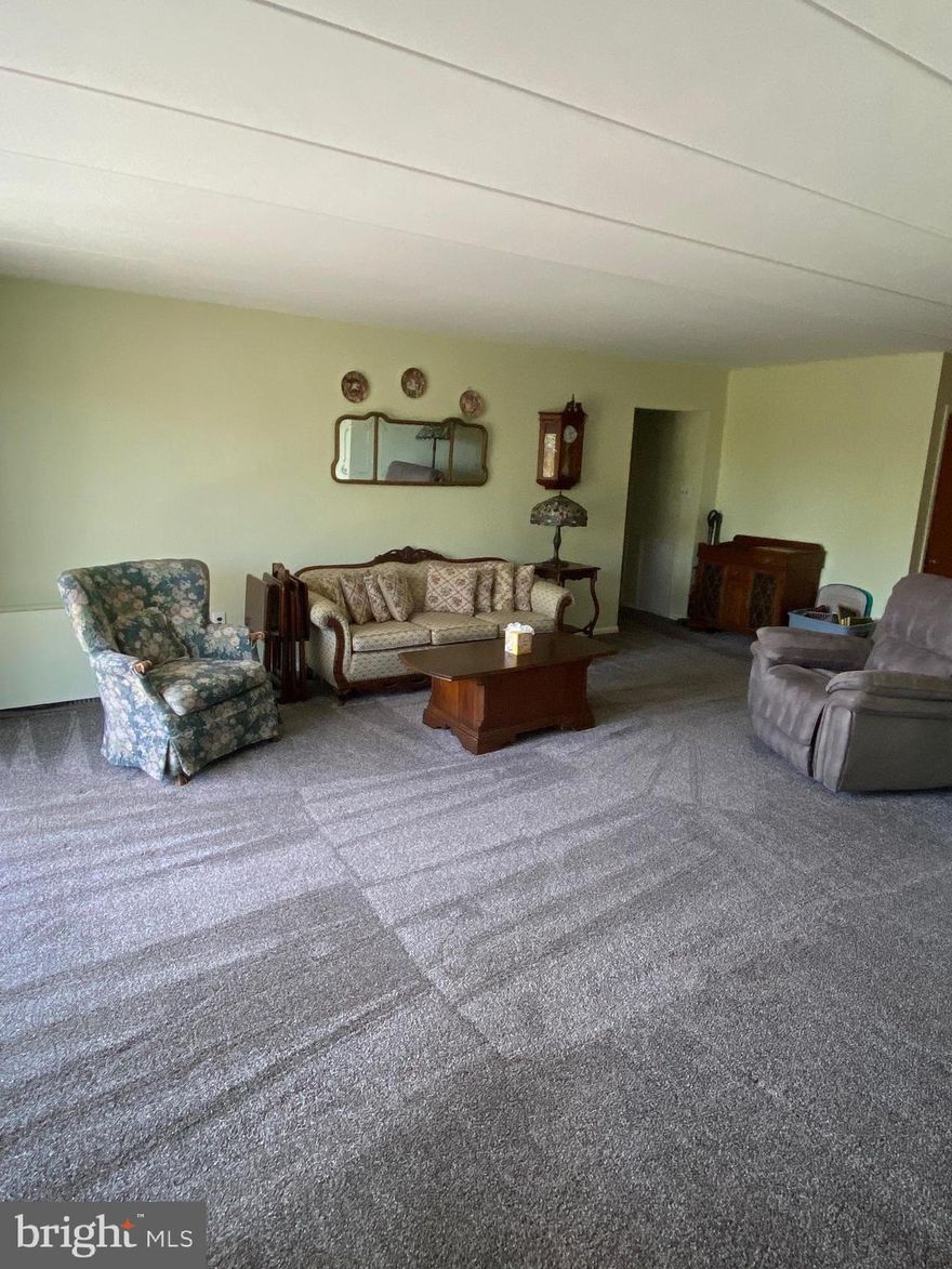 Welcome to 801 S. Chester RD. This spacious 2 bedroom, 2 bath condo with newer carpeting throughout and a fresh coat of paint is waiting for you to call home. When you enter the building you are welcomed with a beautiful lounge, a place to sit and chat with your neighbors.  Upon entering your condo you will first be impressed with the large living room with sliders to your private deck.  The kitchen offers plenty of prep space, lots of cabinets and a full size refrigerator. There is also a dining room/eat in space directly attached to the living room.  The primary bedroom with a walk in closet and private bath complete the Primary suite.  There is also a second bedroom and a full hall bath.  This unit also comes with a storage space on the lower level.  801 S Chester offers a beautiful in ground pool, a laundry on the 3rd floor and a meeting room for residence all for your convenience.
