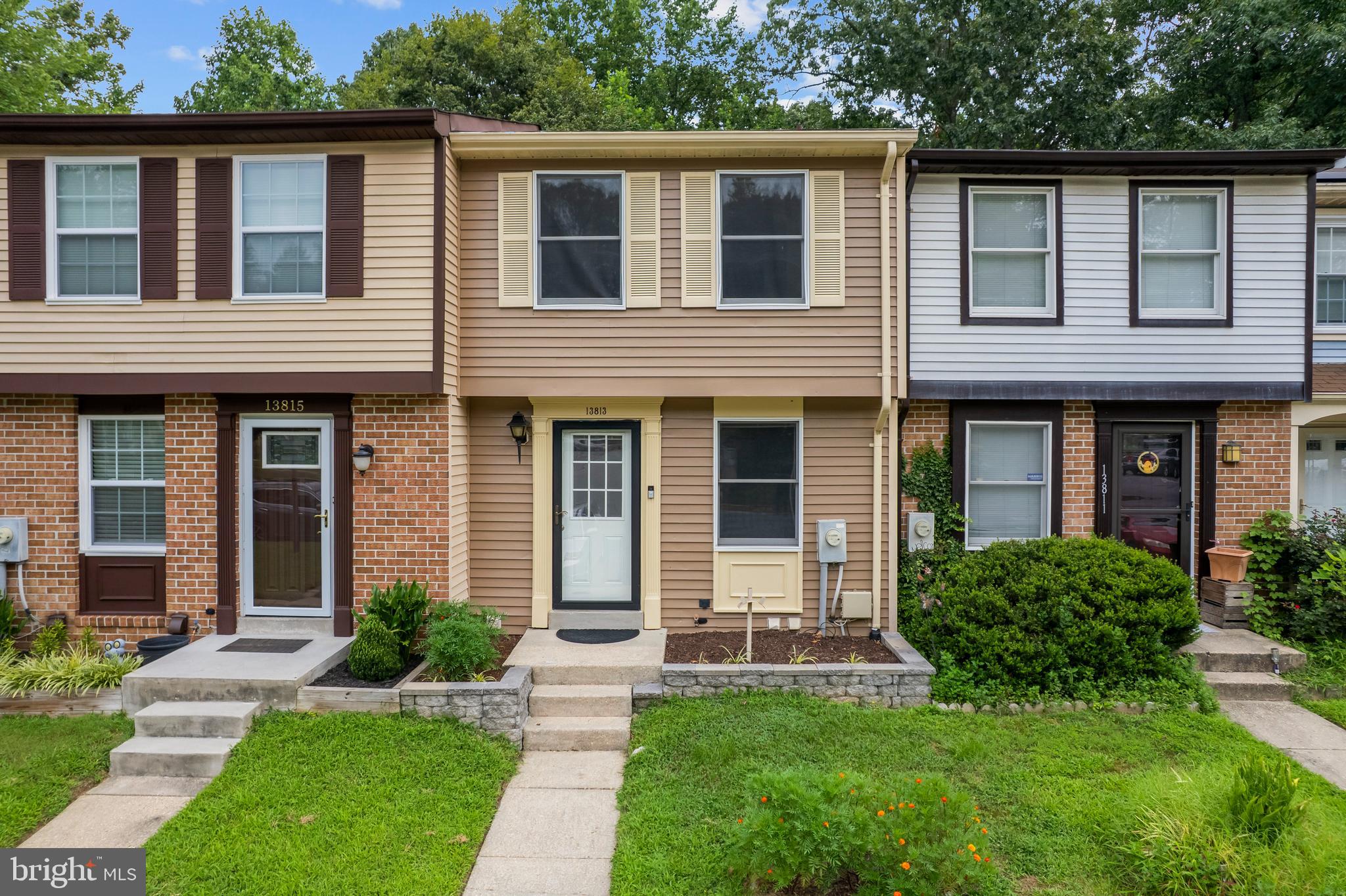 HVAC (Installed 2024), Hot Water Heater (Installed 2023), Roof (Installed 2022)....Welcome to 13813 Palmer House Way, a nature lover and commuter's dream location. This super convenient beautiful 3-Bedroom, 2-Bathroom (3-Level Townhouse) in the desired and walkable community of Greencastle Manor #2 will not disappoint. From the moment you enter this home you'll be greeted with beautiful wood floors on the entire main level, along with a large coat closet or pantry (you chose). Kitchen with Corian Counter-Top, Tile floor, Backsplash, Black & Stainless-Steel & Appliances, and space for a small table to enjoy your favorite cup of coffee. Just off the kitchen you'll find your combination living dining space with sliding glass door that leads out to your main level expansive deck with all the serenity and privacy you'll desire from the tree-lined view. Venturing upstairs you will find laminated flooring throughout, 2 bedrooms with lots of closet space, a primary bedroom with new ceiling fan, dual entry bathroom access, and an in-bedroom vanity area. The fully finished lower-level features laminated flooring throughout, and a large 3rd bedroom with two closets (one being a Cedar-Closet), a full bathroom, laundry room with Washer and Dryer, newer HVAC and 60-gallon Hot Water Heater, as well as additional storage. The lower-level bedroom also offer access to a fully fenced backyard with a concrete patio, and a privacy/security gate. This home is super close to shopping, restaurants, Route 29 Colesville Rd, Route 200-ICC, and less than 3 miles to I-95, and the I-495 beltway. Metro bus stops direct to Silver Spring Metro Station can be found just outside this serene community. The property is also incredibly close to Fairland Recreational Park with Walking and Biking trails, Baseball & Soccer Fields, Basketball & Tennis Courts, and kids play ground & family picnic area. The Fairland Sports and Aquatic Complex, The Gardens Ice- House Skating and Hockey Complex, along with Burtonsville Town Square, Columbia MD, and access to Washington DC, and Baltimore being conveniently just a short drive away.