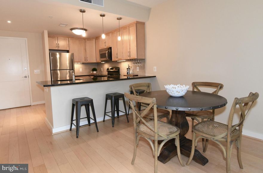 AMAZING NEW PRICE!! NEWLY DECORATED!! Great Spacious 1 Bedroom + DEN, Luxury living at the Residence at Liberty Center.  Private balcony with great views, Modern Kitchen granite counter tops & stainless steel appliances, spacious bathroom with expanded vanity. Plenty of closet space. laundry in unit, garage parking space. 24/7 concierge, rooftop pool, gym + more. Next to shops, dining & the Metro.