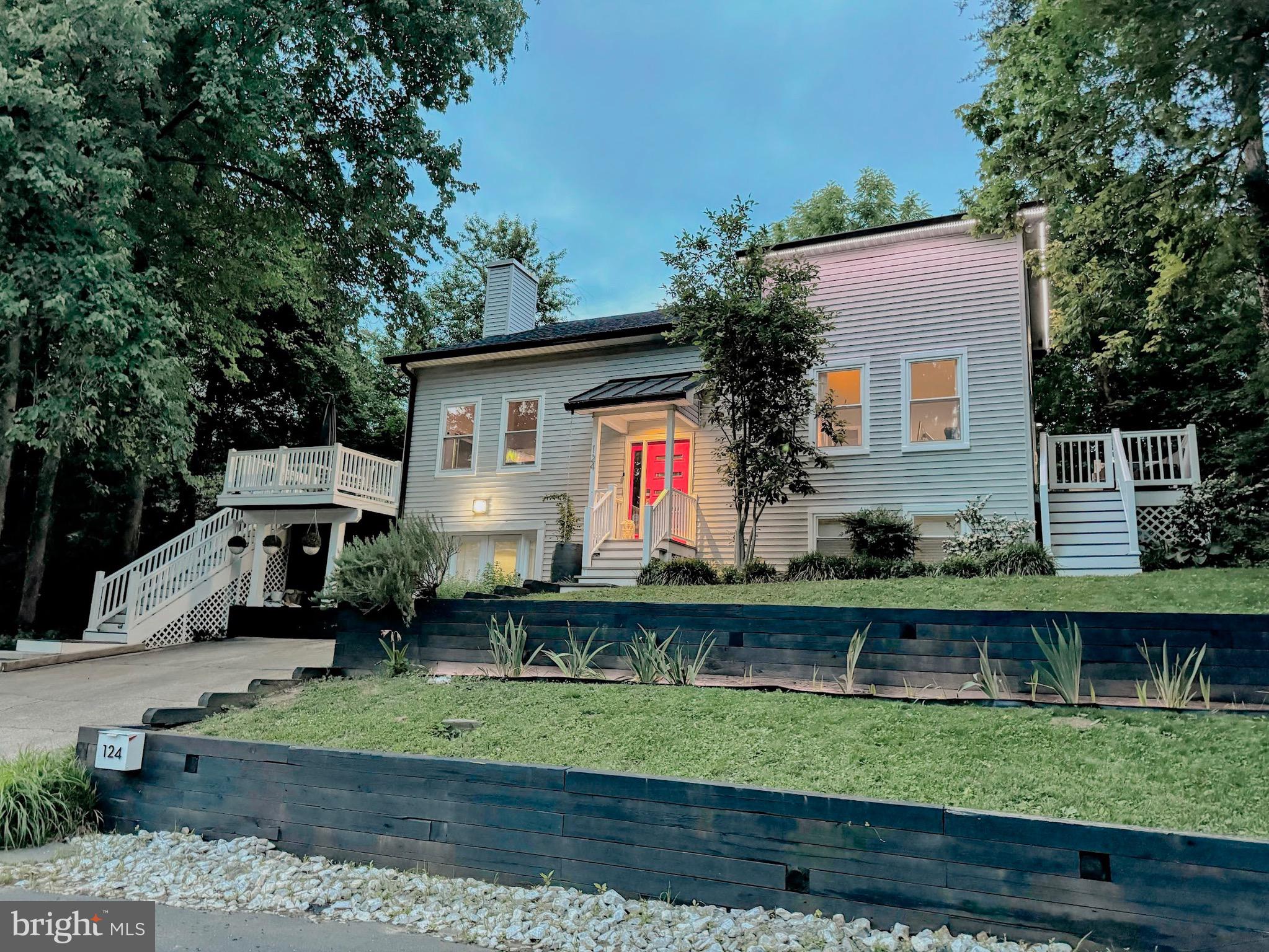 Genius-Level Smart Home, Steps from Dividing Creek in Arnold, Maryland
Welcome to a truly exceptional residence that redefines modern living—this smart home is so advanced, it may just qualify as a genius home! Located just 100 steps from the scenic shoreline of Dividing Creek, you’ll enjoy effortless access to kayaking, paddle boarding, and endless waterfront adventures right from your doorstep.
This striking three-level home offers 5 spacious bedrooms across the 2 upper levels, and a fully private apartment suite on the lower level—ideal for multigenerational living, au pair accommodations, or income-producing rental potential. It’s worth noting that both have dedicated laundry rooms!
From the moment you arrive, the mid-century modern inspired front door and charming portico set the tone for this thoughtfully designed home. Inside, the main level boasts a gourmet kitchen that is equal parts style and function, featuring high-end appliances, extensive cabinetry, stunning granite, a statement sized island, and custom lighting throughout. The open-concept layout connects the kitchen seamlessly to the dining and family rooms, creating the perfect space for gatherings and everyday living.
Natural light pours in through updated windows and doors, illuminating every corner. Two large bedrooms and a beautifully designed powder room complete the main level. From the living room, the dining room and one of the bedrooms there is direct access to an expansive, wraparound deck with multiple zones for dining, lounging, gardening, and entertaining.
Upstairs, discover a dedicated laundry area, a luxurious primary suite with a private balcony, custom closets, and a remodeled bathroom. Two additional bedrooms include one especially magical room designed with whimsical built-in bunk beds, bookshelves, and a secret reading nook nestled in the eaves—ideal for little ones to dream, play, and explore.
The fully finished lower level has its own private entrance and is a world of its own, complete with a living and dining area, efficiency kitchen, full bath, laundry and two private rooms perfect for guests, work, or storage. This space has successfully served as a rental but could just as easily become a private retreat for family or guests.
Additional highlights include multiple outdoor storage sheds, beautifully landscaped surroundings, and smart home technology that enhances security, lighting, ambiance, and efficiency throughout the home. Very near to parks, walking paths, and shopping of all kinds.
All of this is situated in the heart of Arnold—just minutes to Annapolis, and within easy reach of D.C. and Baltimore for commuting convenience. This is more than a home; it’s a lifestyle.
p.s. Do not miss the proximity to the park at the top of the hill. - great pathways, and green space to enjoy.
Schedule your private showing today before this water oriented gem is gone!