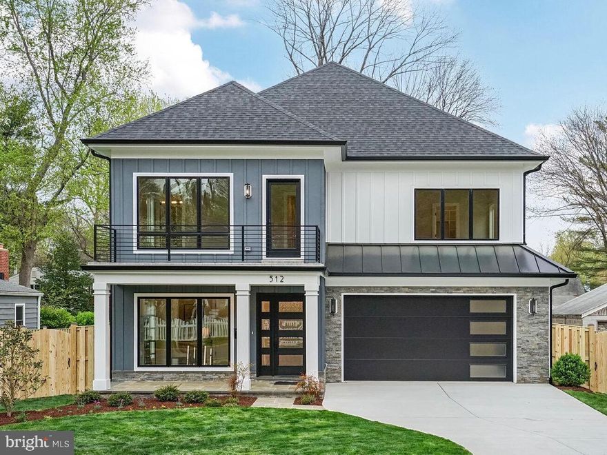 Gorgeous, new contemporary farmhouse with over 4600+ sq ft of thoughtfully designed living space in Falls Church City! Situated on a quiet street within walking distance of Oak St elementary school, this three level home with a charming front porch features a total of 6 bedrooms and 6.5 baths. An expansive main level is beautifully configured for family living with an open dining room and spacious family room with exposed wood beams and gas fireplace with striking custom marble surround all stepping out to a back deck with outdoor kitchen and fully fenced back yard. A large gourmet kitchen with SubZero Fridge and breakfast room are just steps from a custom mudroom with loads of storage.  An additional office/bedroom and bath on the main level provides ultimate flexibility. The first upper level offers four bedrooms, including the spa-like primary suite complete with Juliet balcony, an expansive walk-in closet, ensuite bath with heated floors, soaking tub and generously proportioned tile shower. The other bedrooms on this level each have their own bathroom, and one steps to its own private balcony. The second upper level features a rec room with a wet bar, and a fifth bedroom with ensuite bath. All ceilings are 9’ and wide-width hardwood floors are throughout. Lots of details you can see and can't see: Herringbone wood floors in foyer, fully spray-foamed house package for incredible energy savings, outlets hidden in base trim throughout, Pella Windows, SubZero drink fridges, hard-wired for generator. The Little City is growing rapidly and offers a wide variety of restaurants and shops and our renowned Farmer’s Market. Conveniently located minutes to Metro, 66 and 495 and the Mosaic District.