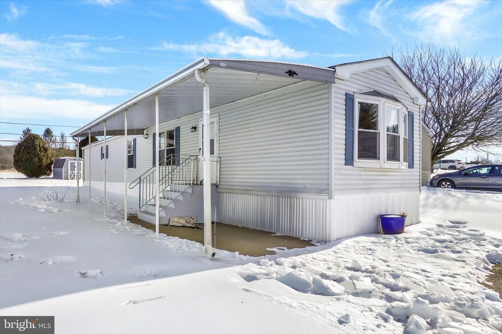 Photo of 107 Carbridge Road E, STEWARTSTOWN, PA 17363 (MLS # PAYK2097488)