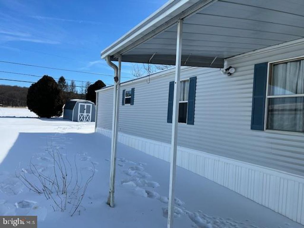 Photo of 107 Carbridge Road E, STEWARTSTOWN, PA 17363 (MLS # PAYK2097488)