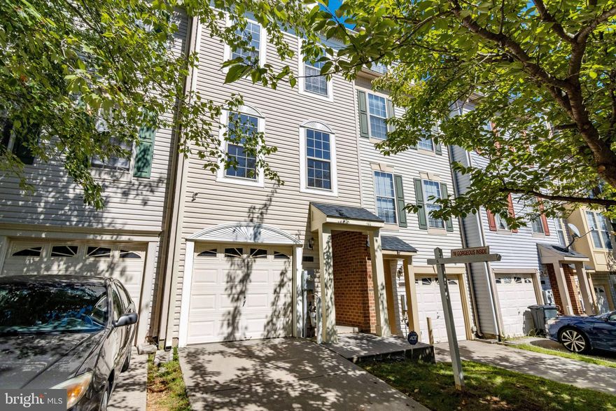 Welcome Home! This spacious four-level,  three bedroom, 2.5 bath garage townhouse is located in the convenient location of Owings Mills. Low maintenance upgrades for years to come.  A new 50-year warrantied architectural shingle roof (2020), exterior wrapped wood trim and new gutters (2021), & newer furnace/AC and water heater (2016). The entrance level features a large flex space as well as access to your walkout into the backyard. The 2nd level features a living room/ dining room with a half bath for the convenience of you and your guest(s). Enjoy the bright open eat-in kitchen illuminated by vaulted ceilings, two brand new skylights (2020), and the view of the dramatic overlook of your flex space below. As you make your way to the third level you will find two ample sized bedrooms with a shared full hall bathroom and spacious laundry room.  That's right, no more lugging laundry to and from the basement.  Retreat to the fourth level owner's suite with vaulted ceilings, three closets, and sitting area to enjoy your peace and privacy.  The en suite bathroom features a jacuzzi tub & separate shower for relaxing after a long day.  What else could this beautiful home  and location have to offer?   Freshly painted with carpets professionally cleaned ready for you to move-in!  This amazing location has access to community amenities which includes three community pools, a playground/tot lot, dog park, and beautiful landscaping throughout.  You’ll also be close to public parks, schools, shopping, and restaurants at the Mill Station and Foundry Row with quick access to the Metro Station and I-795.