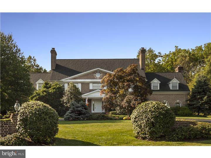 The distinguishing characteristic of this residence: QUALITY. From the solid, all-brick exterior to the recently installed, 50-year Grand Manor Roof, this home delivers superior materials and craftsmanship. Custom woodwork welcomes you into the two-story foyer. Newly updated kitchen with Dacor stove, Miele dishwasher, beverage chiller and large center island provides space for gourmet cooking as well as entertaining. An inviting family room is complimented by beamed ceilings, built-in cabinetry and spectacular brick fireplace. Upstairs, bedroom suites with private bath and sitting room provide the perfect space for 'quite time'. Stately master suite with fireplace and private den (or exercise room) completes the second floor. Zoned heat/AC, indoor/outdoor sound system, primed elevator shaft and climate controlled wine room add to the affluence of this home. In addition to excellent construction, appealing cul-de-sac location; large, private, backyard (bordering the Philadelphia Cricket Club grounds) and prominent, residential community can all be found here. Impeccably maintained. Priced to sell.
