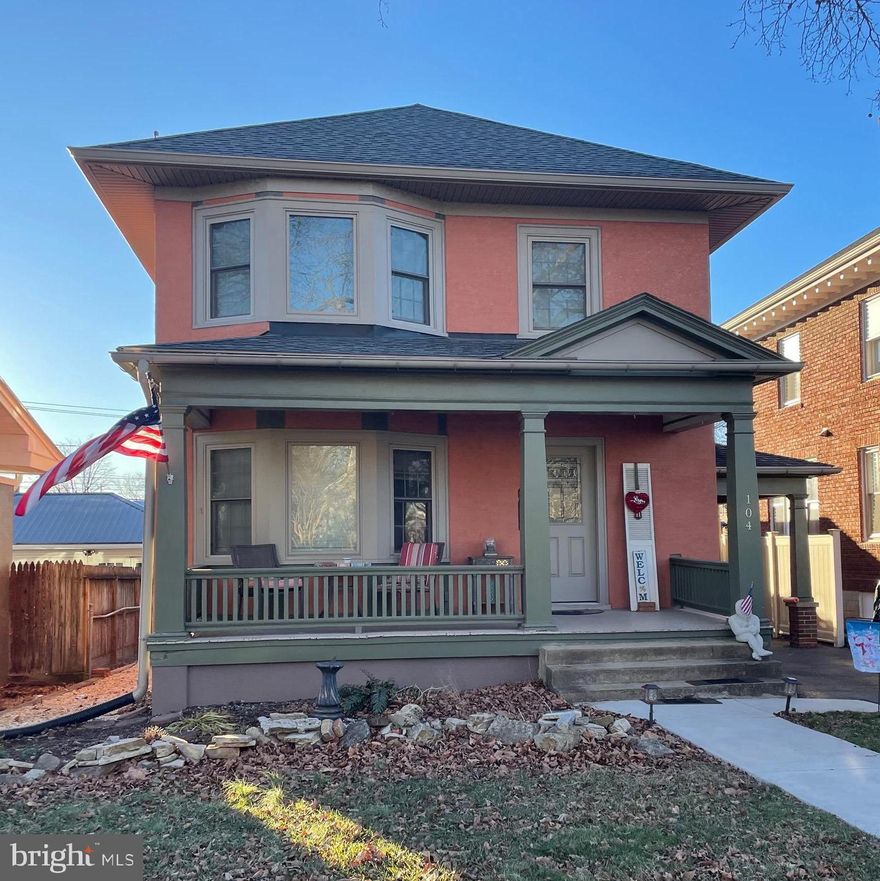 Don't miss out on this Traditional "American Foursquare" home on one of the nicest streets in town.  Presenting 104 N Tennessee Avenue.    You will be impressed when you arrive to see the outside of home has recently been insulated and stucco and all new double hung windows, doors, soffit and gutters and large front porch welcomes you to the three bedrooms, home with hardwood floors throughout.  You enter through the beveled glass front door into the spacious foyer where you glimpse the bygone era of this lovely, well-made home.  The grand staircase greets you while the inviting living room, dining room and kitchen beckon you to explore the gracious main level.   The home features three levels of bump out first visible in large living room.  There is a pocket door between the living and dining room.  Dining room has crown molding and built-in displays/storage cabinet and new split unit for luxury of central air/force air heat on the main level.  The kitchen is nicely outfitted with newer appliances and has a door the back porch plus access to finished basement.   Between the foyer and kitchen is the butler's pantry.  Upstairs are three large bedrooms.  The third does not have a closet but does have staircase leading to the attic... a truly special place that just oozes potential if finished could be anything your imagination dreams of.  Main bedroom has access to the balcony for you to relax and enjoy.  The home's main level bathroom is on this level and has been totally remodeled to include a large walk-in shower and added charm.  New split unit added to this level to enjoy all the character of home with the added convenience and comfort.  Basement is a cozy finished recreation room with electric fireplace.  The separate laundry room and half bath are on this level plus a storage room.  Out the back you will arrive on back porch to the back large back yard, has easy alley access and a shed with electric and new metal roof that matches the house color scheme.  Your parking is off street and includes a covered parking spot.  Ample street parking can also be found, home is close to downtown but easy access to I-81.