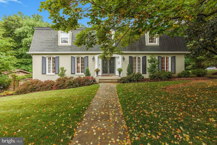 Elegant 5 BR, 5 BA colonial just one stoplight to DC.  The sun filled main level boasts floor-to-ceiling windows, a gorgeous top-of-the-line kitchen and main level bedroom with newly renovated full bath.  A spacious master suite features sitting area, breakfast bar, dual walk-in closets and spa like bath.  Walk-out lower level opens has bonus room, full bath and opens to patio & private back yard.