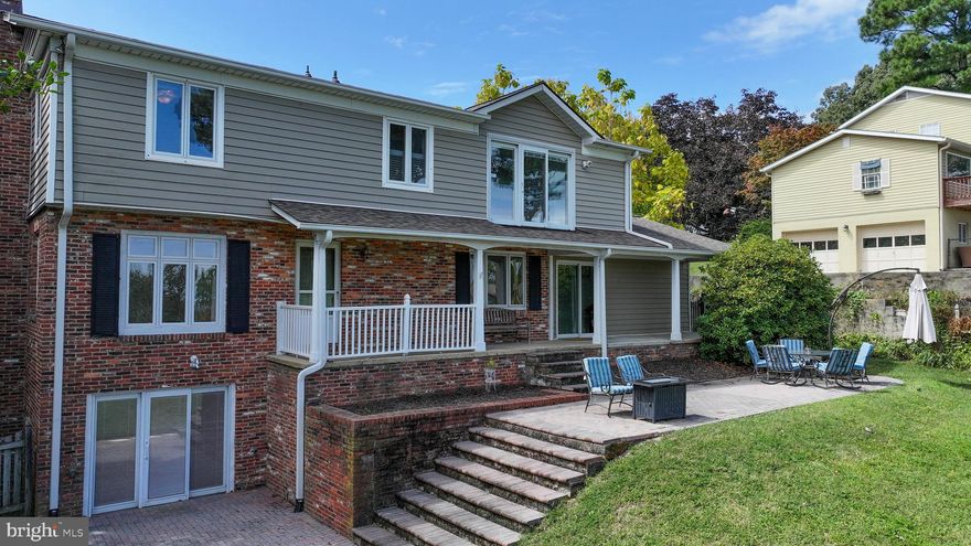 Stunning Waterview Home in Prime Water Privileged Neighborhood

Discover this beautiful, spacious residence offering water views and luxurious living. This large 4-bedroom home features three and a half bathrooms, perfect for water-oriented living and entertaining.  Enjoy a gourmet kitchen equipped with a large island—ideal for family meals and gatherings. Gorgeous refinished wood floors throughout the main and upper floors.  Eat-in kitchen and formal dining area. Additional highlights include a spacious master suite with a private bath,   access within a highly sought-after water-privileged community. Recreation area in lower level has two walk outs, one opens to yard, the other opens to the front with it's own driveway, perfect for a game room, potential for a 5th bedroom (full bath is already there) great for guests as it is. Relax on the covered porches or entertain guests on the spacious patio,  outdoor living with views of the bay.  Situated on a large lot, this home provides ample outdoor space and privacy. Plenty of room for building an in-ground pool. 2 wood fireplaces for cozy winter evenings. This community features 5 beaches and parks, 3 Marinas, a boat launch, ballparks, and Basketball Courts, as well as a pool (waiting list but swim team does not require membership) sailing school and Community Center. Home of the yearly Strawberry Festival, the community amenities will impress.