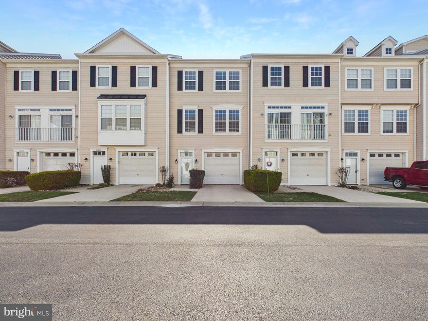 Welcome to refined coastal living in the sought-after Fairfield at Long Neck, where style, space, and convenience come together in one beautifully designed townhouse.

Step inside and you’re greeted by a welcoming entry hallway with direct access to the garage—perfect for everyday ease and functionality. Upstairs, the home opens into a bright and airy main living level where natural light pours through, highlighting an expansive open-concept layout. The seamless flow between the living area and kitchen creates the ideal space for both relaxing and entertaining. The spacious 2-car garage is complemented by additional off-street parking, providing ample room for residents and guests alike.

The kitchen is a true centerpiece, featuring an island, generous cabinetry, and a dedicated breakfast area—perfect for casual mornings or hosting guests. This home is a tech-lover's dream, featuring a fully integrated smart-home ecosystem including a Ring doorbell, Nest thermostat, and MyQ smart garage—all controllable from your phone. The kitchen is anchored by a premium suite of Samsung Black Stainless Steel appliances (all included) and a newly installed range hood. With app-integrated connectivity throughout, this home offers a modern lifestyle that is truly move-in ready. Just beyond, step out to your private screened terrace, offering a peaceful retreat for enjoying coastal breezes year-round.

The upper level is thoughtfully designed for comfort and privacy, featuring three spacious bedrooms. The primary suite serves as a tranquil escape, complete with its own private bathroom, while additional bedrooms provide flexibility for guests, family, or a home office.

Beyond the home itself, residents of Fairfield at Long Neck enjoy a relaxed coastal lifestyle with access to community amenities including a swimming pool, all set within a convenient location near the Indian River Bay. The surrounding Long Neck area is rich with lifestyle appeal—offering walking paths, nearby marinas, local dining, and easy access to beach destinations like Rehoboth and Lewes, all just a short drive away.

Whether you’re searching for a full-time residence or a coastal getaway, this home delivers the perfect blend of low-maintenance living, modern comfort, and proximity to everything that makes Delaware beach living so desirable.