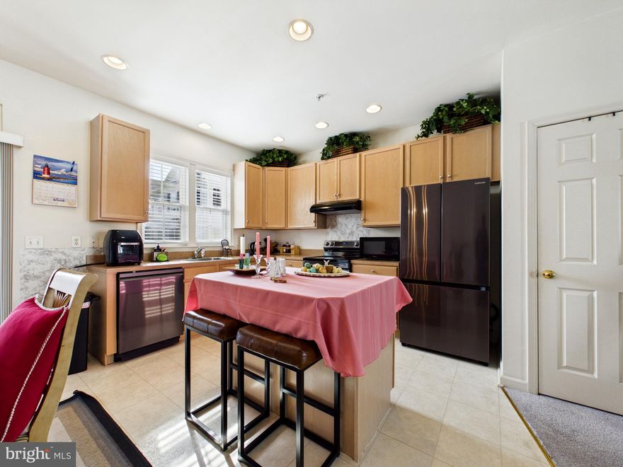 Spacious 1,788 sq. ft. home featuring a premium Samsung Black Stainless kitchen suite, integrated smart home technology, and high-efficiency Andersen upgrades.

Step inside and you’re greeted by a welcoming entry hallway with direct access to the garage—perfect for everyday ease and functionality. Upstairs, the home opens into a bright and airy main living level where natural light pours through, highlighting an expansive open-concept layout. The seamless flow between the living area and kitchen creates the ideal space for both relaxing and entertaining. The spacious 2-car garage is complemented by additional off-street parking, providing ample room for residents and guests alike.

The kitchen is a true centerpiece, featuring an island, generous cabinetry, and a dedicated breakfast area—perfect for casual mornings or hosting guests. This home is a tech-lover's dream, featuring a fully integrated smart-home ecosystem including a Ring doorbell, Nest thermostat, and MyQ smart garage—all controllable from your phone. The kitchen is anchored by a premium suite of Samsung Black Stainless Steel appliances (all included) and a newly installed range hood. With app-integrated connectivity throughout, this home offers a modern lifestyle that is truly move-in ready. Just beyond, step out to your private screened terrace, offering a peaceful retreat for enjoying coastal breezes year-round.

The upper level is thoughtfully designed for comfort and privacy, featuring three spacious bedrooms. The primary suite serves as a tranquil escape, complete with its own private bathroom, while additional bedrooms provide flexibility for guests, family, or a home office.

Beyond the home itself, residents of Fairfield at Long Neck enjoy a relaxed coastal lifestyle with access to community amenities including a swimming pool, all set within a convenient location near the Indian River Bay. The surrounding Long Neck area is rich with lifestyle appeal—offering walking paths, nearby marinas, local dining, and easy access to beach destinations like Rehoboth and Lewes, all just a short drive away.

Whether you’re searching for a full-time residence or a coastal getaway, this home delivers the perfect blend of low-maintenance living, modern comfort, and proximity to everything that makes Delaware beach living so desirable.