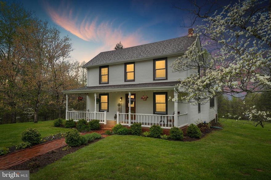 Welcome to 412 Nelmonte Lane—a beautifully updated 3-bedroom, 2-bath home set on 6.88 landscaped acres in the heart of Nelson County. This 2,008 sq ft retreat combines rustic character with stylish modern updates, offering comfort, charm, and wide-open views.
Inside, you’ll find gleaming hardwood floors throughout, wood beam ceilings, and exposed brick that add warmth and timeless appeal. The oversized galley kitchen features quartz countertops, soft-close cabinetry, nearly new stainless steel appliances and an abundance of windows that flood the space with natural light.
The spacious family room, anchored by a cozy gas fireplace encased with a brick surround is perfect for gathering, while the primary suite offers a peaceful escape with its own wood-burning fireplace.
Outside, enjoy mature trees, extensive landscaping, and a 10x16 shed with electric—ideal for hobbies, storage, or a workshop. A whole-house generator ensures year-round peace of mind. With Priest mountain views and walkable access to the Tye River, this home is your ideal private retreat in beautiful Nelson County